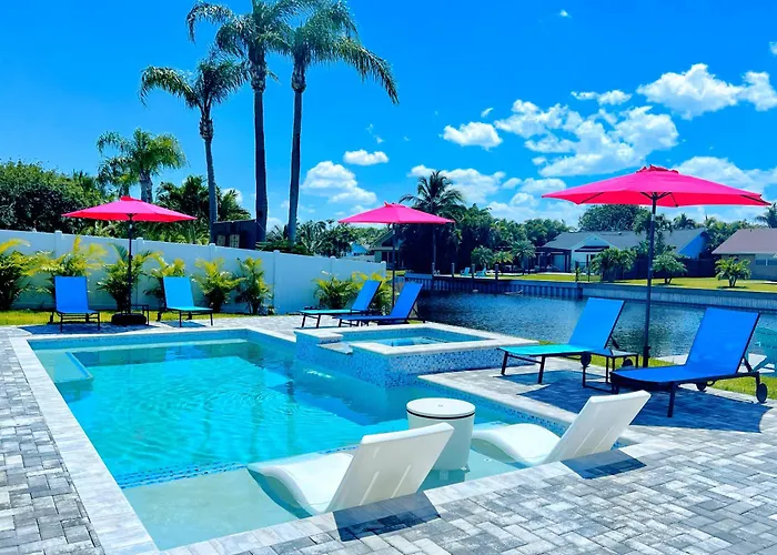 New Stunning Delray Waterfront Oasis - Heated Pool, Spa, Canal, Dock, Huge Patio, Pool Table!