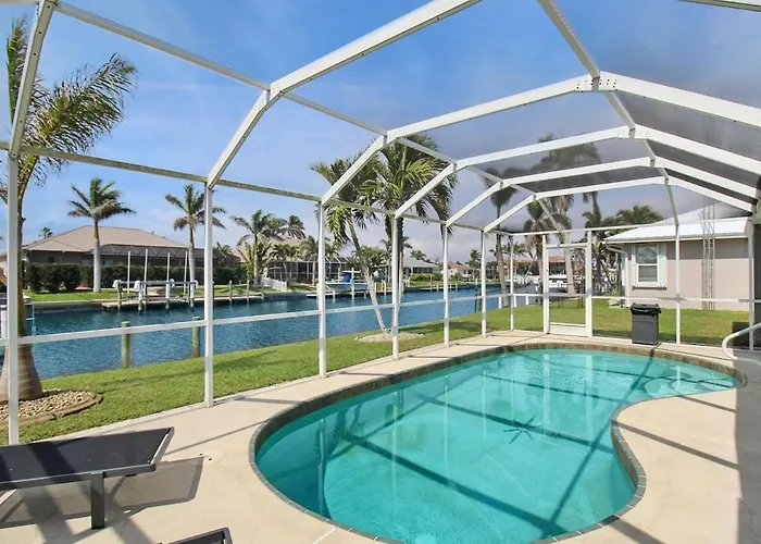 Chic & Modern Canal-Front Retreat With Private Pool - Azure Tides