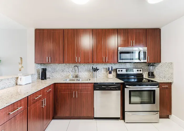 Across From Beach | Balcony • Pool • Parking • 2Br
