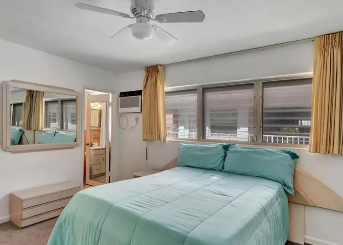 One Bedroom Condo With Waterfront Balcony And Coastal Breezes